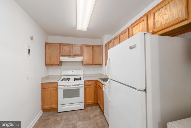 kitchen featuring white appliances