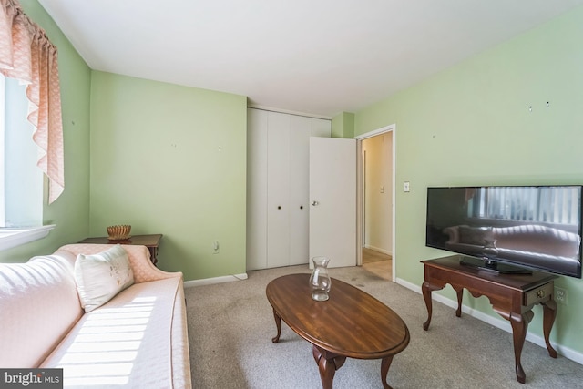 130 Slade Ave Unit 213, Pikesville, MD 21208 - carpeted living area featuring baseboards