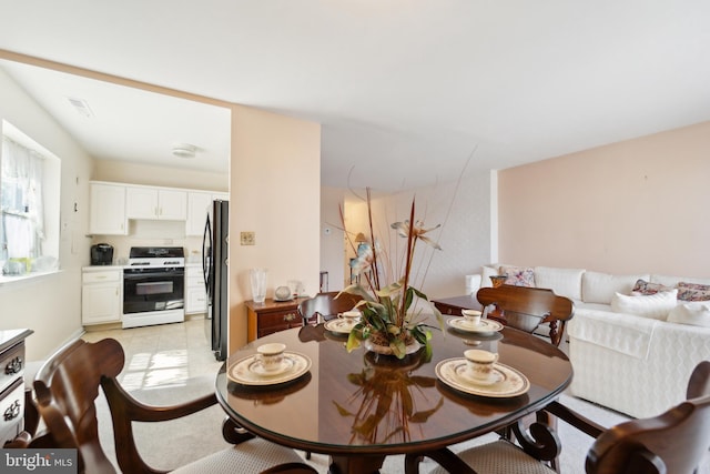 130 Slade Ave Unit 213, Pikesville, MD 21208 - dining area featuring visible vents