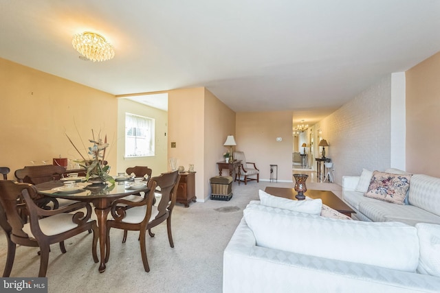 130 Slade Ave Unit 213, Pikesville, MD 21208 - living room with a chandelier and light carpet