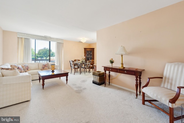 130 Slade Ave Unit 213, Pikesville, MD 21208 - living area with carpet flooring and baseboards
