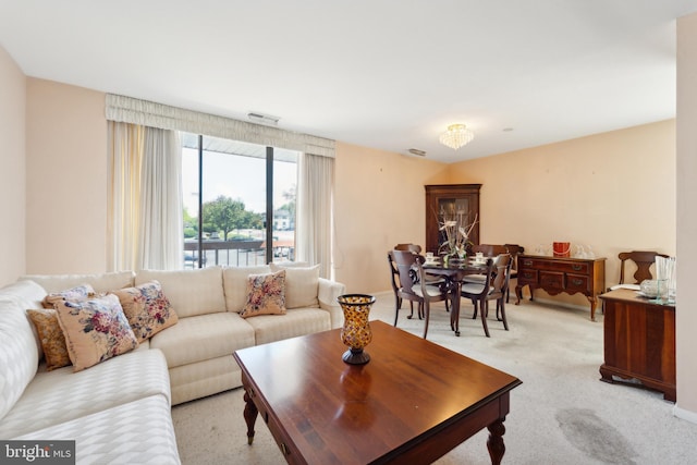 130 Slade Ave Unit 213, Pikesville, MD 21208 - living area featuring visible vents and light colored carpet