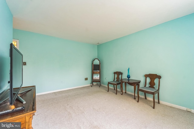 130 Slade Ave Unit 213, Pikesville, MD 21208 - sitting room with baseboards and carpet flooring