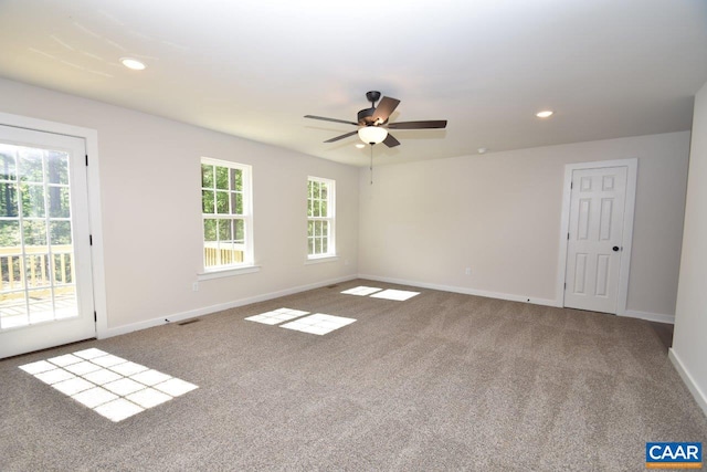 unfurnished room featuring carpet floors, baseboards, a ceiling fan, and recessed lighting