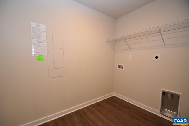 clothes washing area featuring hookup for a washing machine, hookup for an electric dryer, laundry area, baseboards, and dark wood finished floors