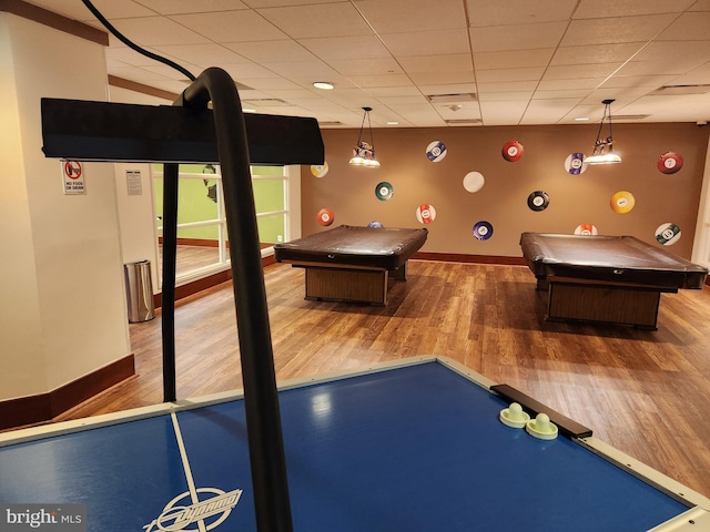 rec room with pool table and hardwood / wood-style flooring