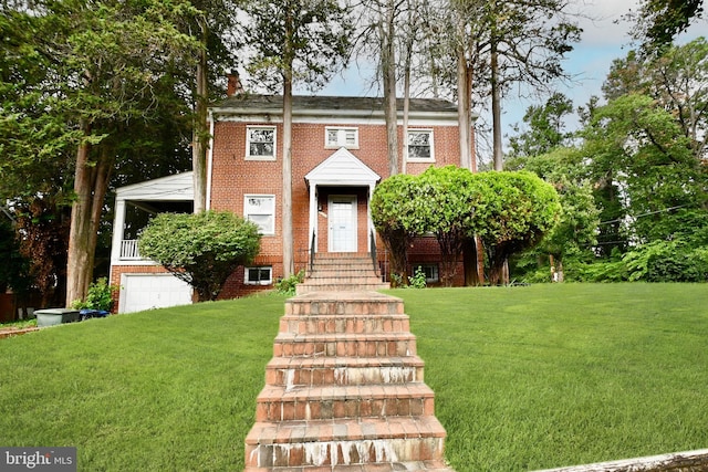 view of front facade featuring a front yard