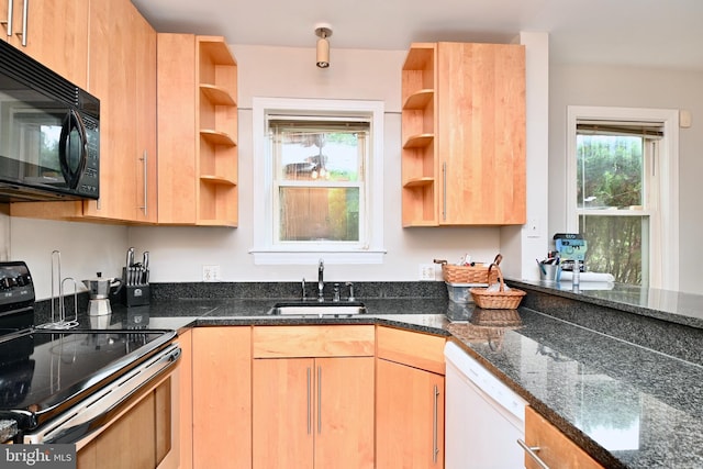 kitchen featuring sink, dark stone counters, electric range, and white dishwasher