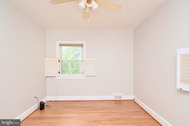 spare room with ceiling fan and light hardwood / wood-style flooring