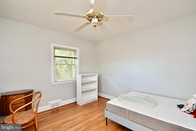 bedroom featuring ceiling fan and light hardwood / wood-style floors