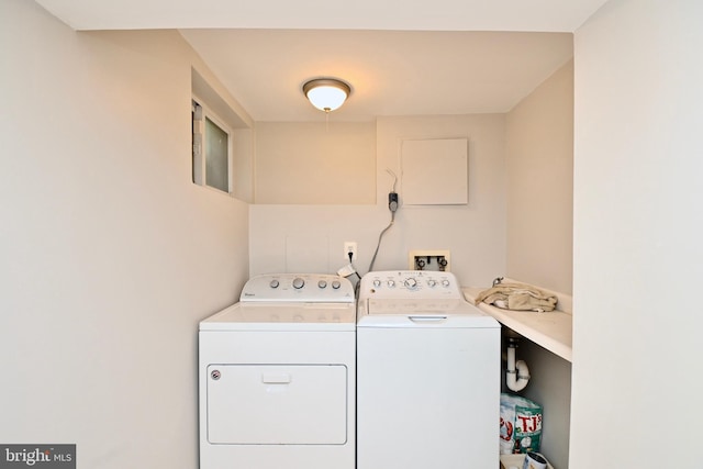 laundry area featuring washing machine and dryer