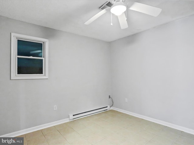 empty room with a baseboard heating unit, ceiling fan, and baseboards