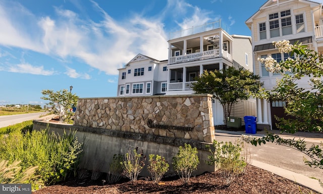 exterior space featuring a balcony