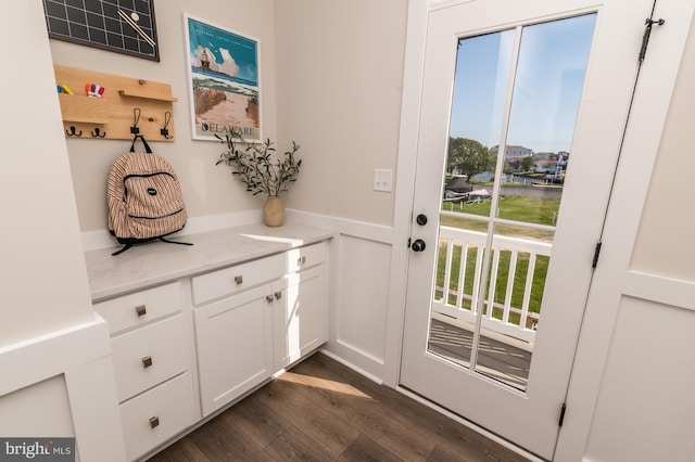 doorway to outside featuring dark hardwood / wood-style floors