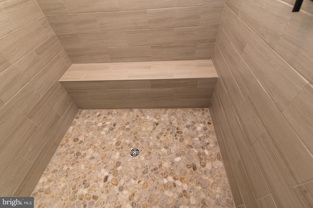 room details with a tile shower