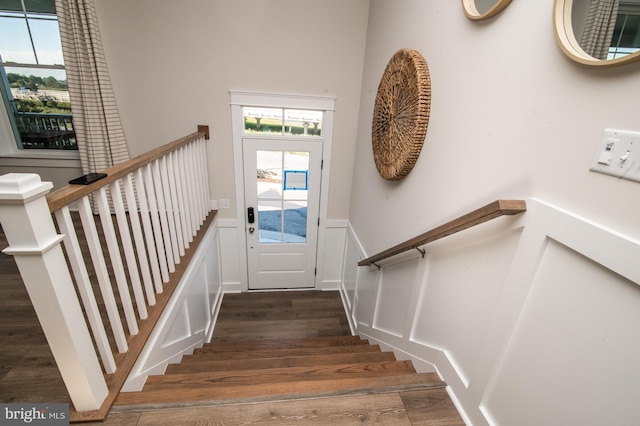 staircase featuring hardwood / wood-style floors