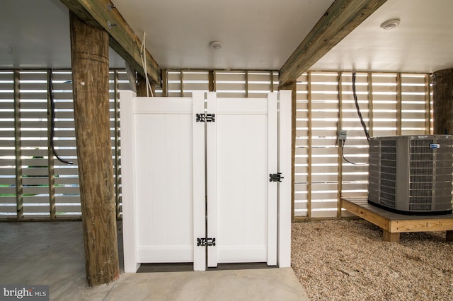 interior space featuring concrete floors and central AC