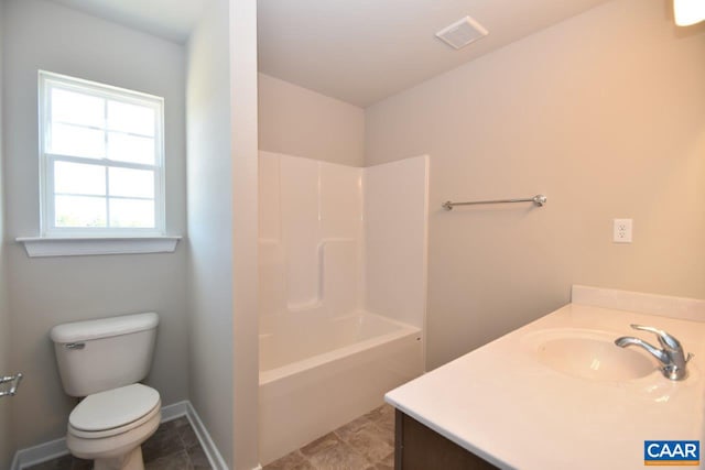 full bathroom featuring shower / bath combination, tile patterned floors, toilet, and vanity