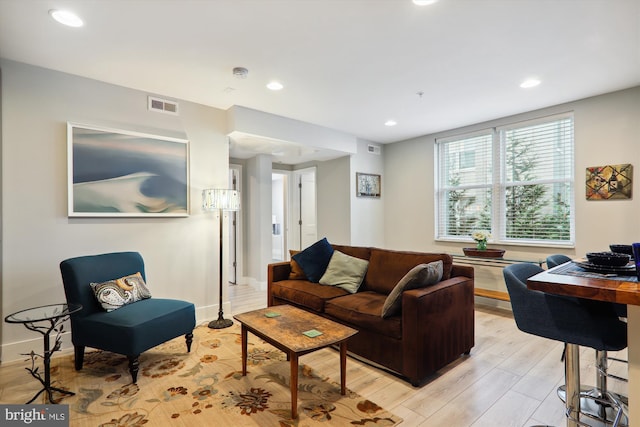 living room featuring light wood-type flooring