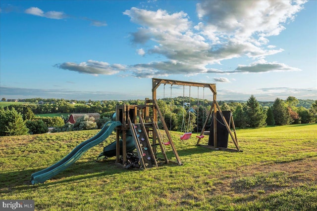 view of playground with a yard