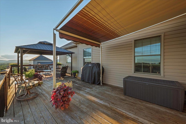 deck with a gazebo and grilling area