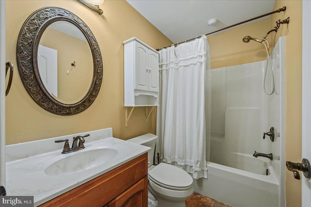 full bathroom featuring tile patterned floors, toilet, shower / bath combo with shower curtain, and vanity