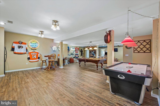 game room featuring hardwood / wood-style floors and pool table