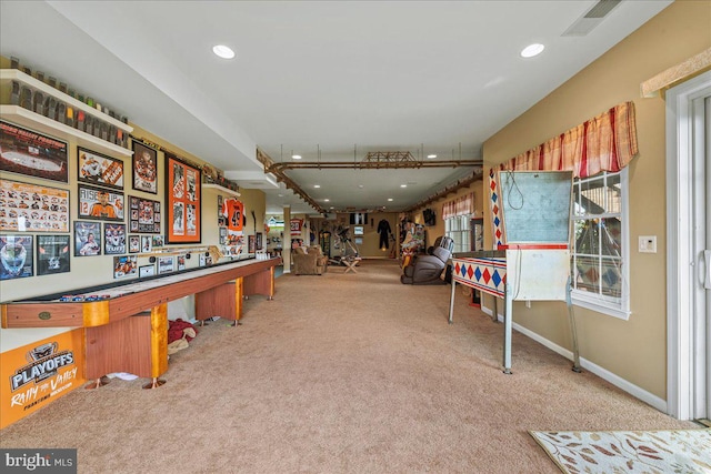 playroom featuring light colored carpet