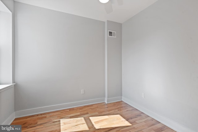 unfurnished room featuring light hardwood / wood-style flooring