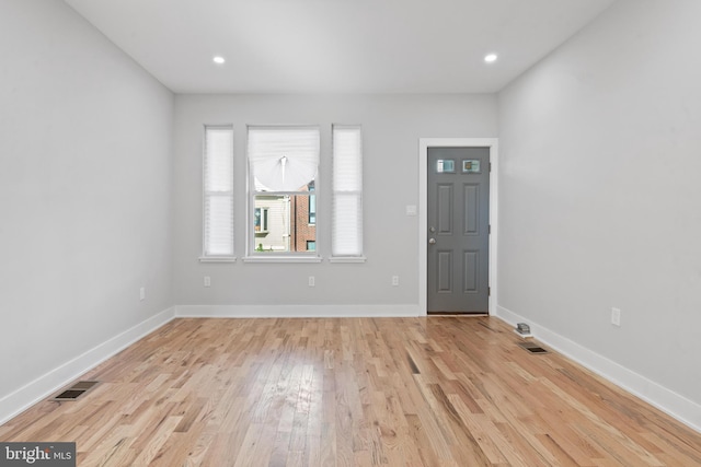 entrance foyer featuring light wood-type flooring