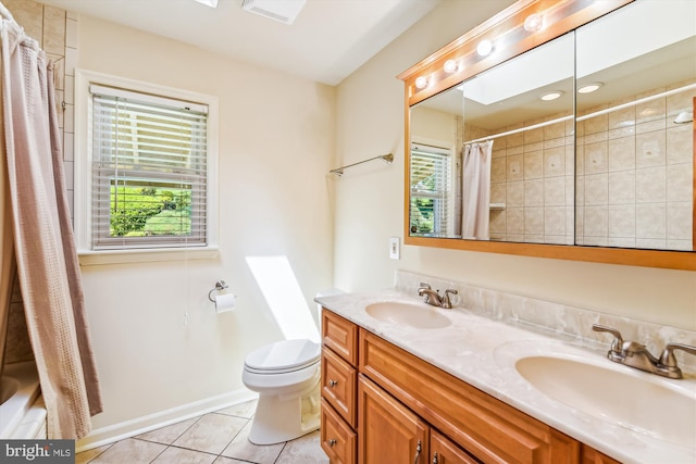 full bathroom with tile patterned flooring, vanity, shower / bathtub combination with curtain, and toilet