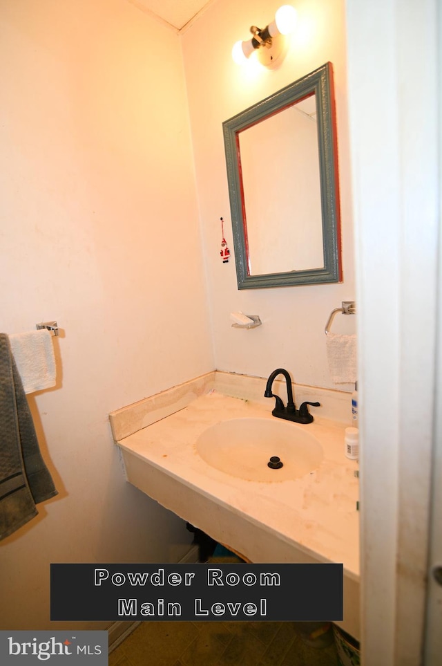 bathroom with sink and tile patterned floors