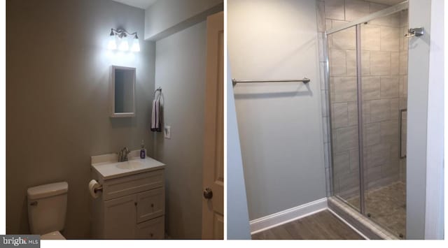 bathroom featuring vanity, hardwood / wood-style floors, toilet, and walk in shower