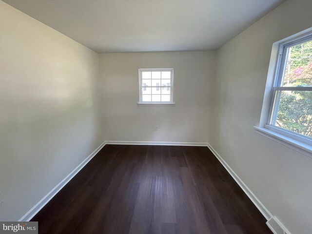 empty room featuring hardwood / wood-style floors