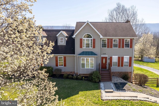 view of front of house with a front yard