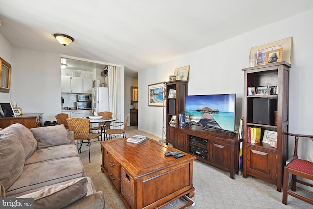 living room with light colored carpet