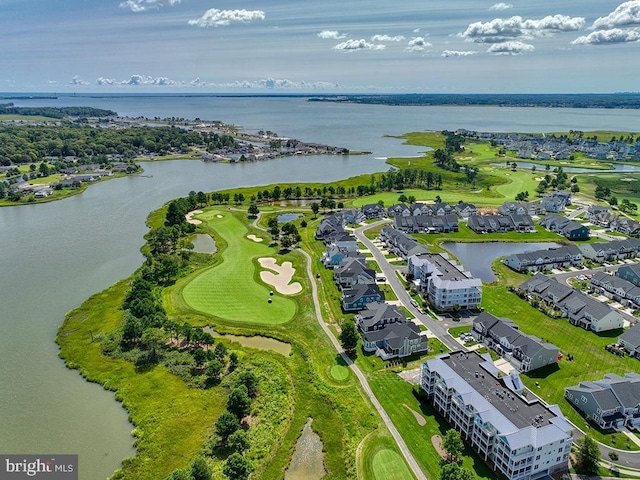 bird's eye view featuring a water view and a residential view