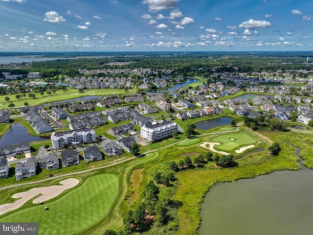 aerial view with view of golf course, a water view, and a residential view