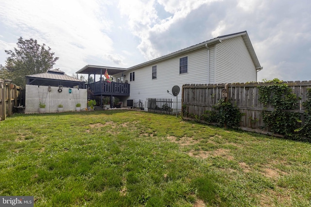 view of yard featuring a deck