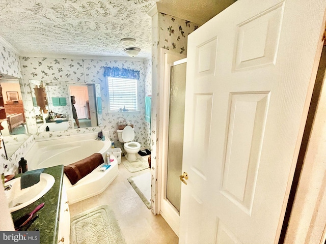 full bathroom with shower with separate bathtub, tile patterned floors, a textured ceiling, vanity, and toilet