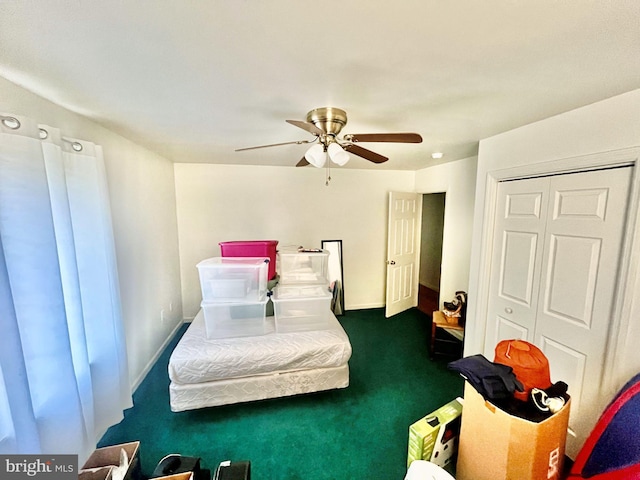 carpeted bedroom featuring a closet and ceiling fan