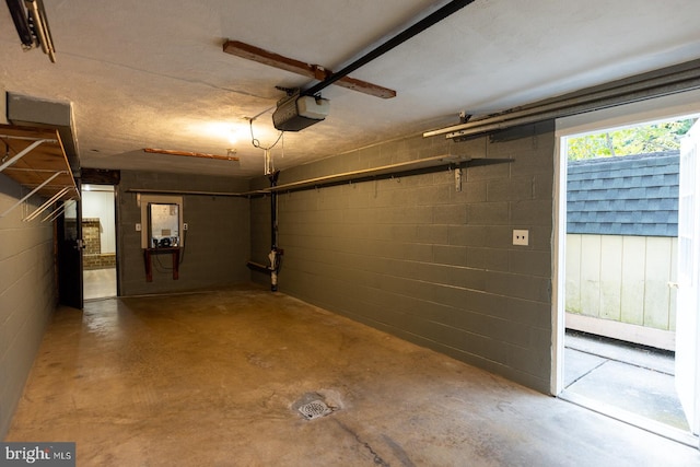 garage featuring a garage door opener