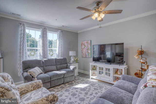 living room featuring ceiling fan, crown molding, and hardwood / wood-style floors