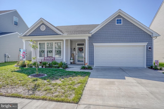 view of front of house featuring driveway, covered porch, a garage, and a front lawn