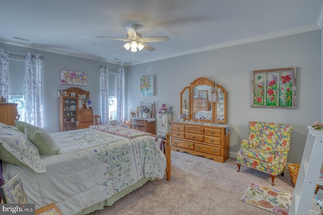 bedroom with crown molding, multiple windows, and light colored carpet