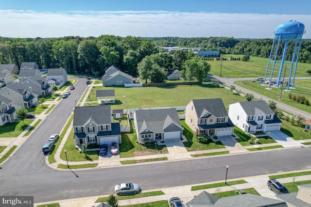 birds eye view of property with a residential view