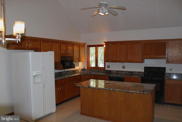 kitchen featuring ceiling fan, light tile patterned floors, a kitchen island, and black appliances