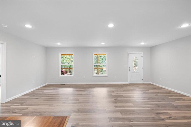 spacious closet featuring hardwood / wood-style floors