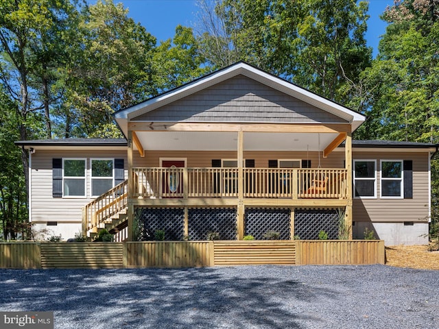 view of front of house with a deck