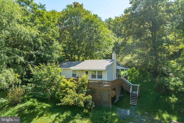 view of home's exterior featuring a deck